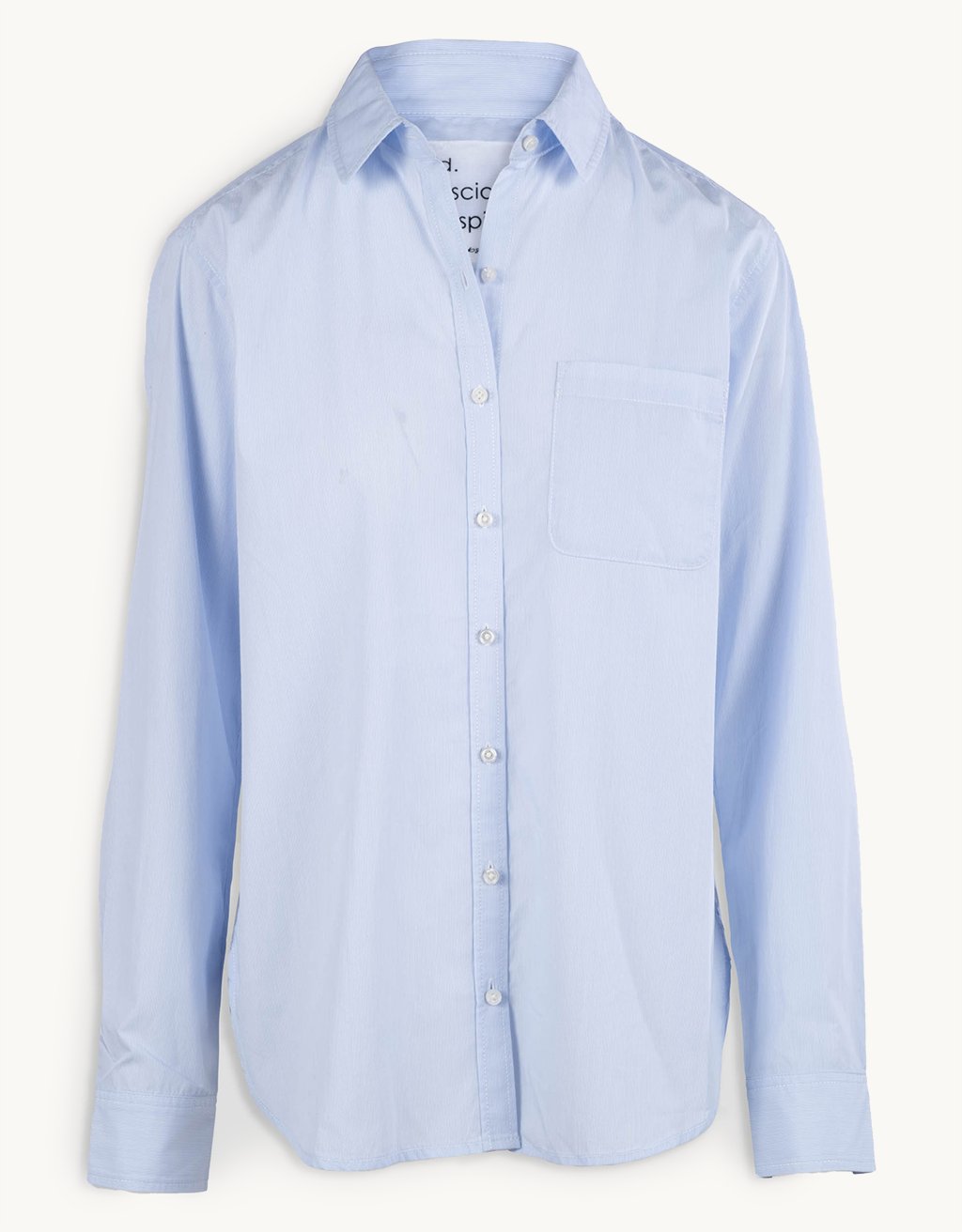 Light blue button down shirt on a white background