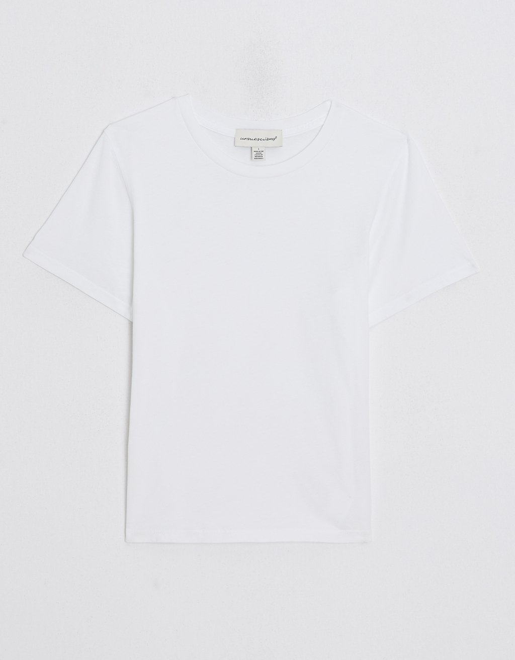 White t-shirt on a light gray background