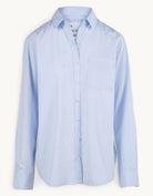 Light blue button down shirt on a white background
